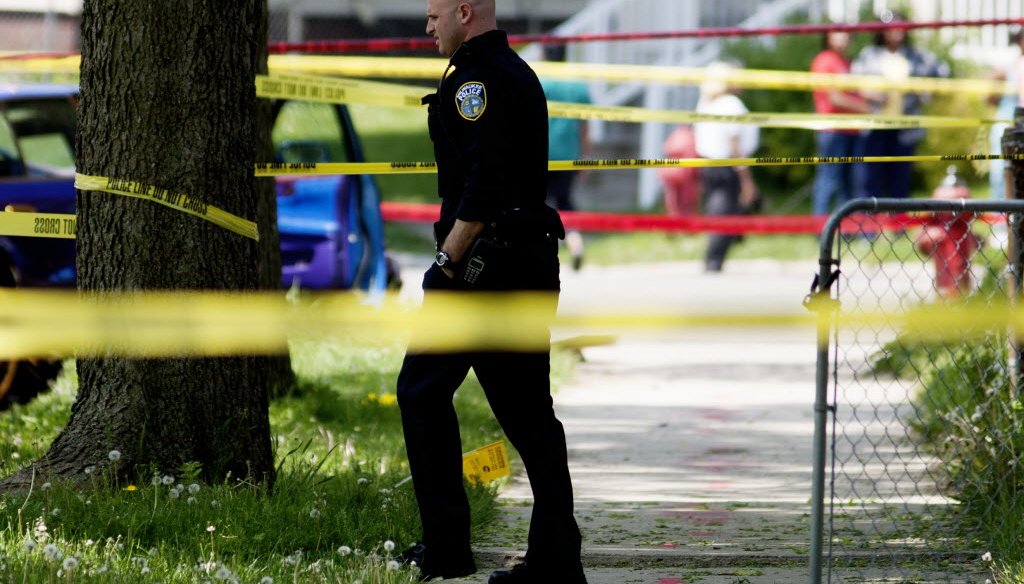 Police investigate the scene of a triple-shooting in Milwaukee on May 23, 2016. (Calvin Mattheis photo)