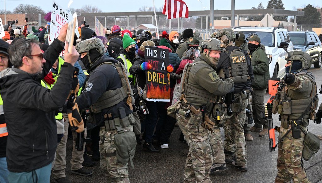 Protesters confront federal agents outside the Bishop Henry Whipple Federal Building, Jan. 8, 2026, in Minneapolis, Minn. (AP)