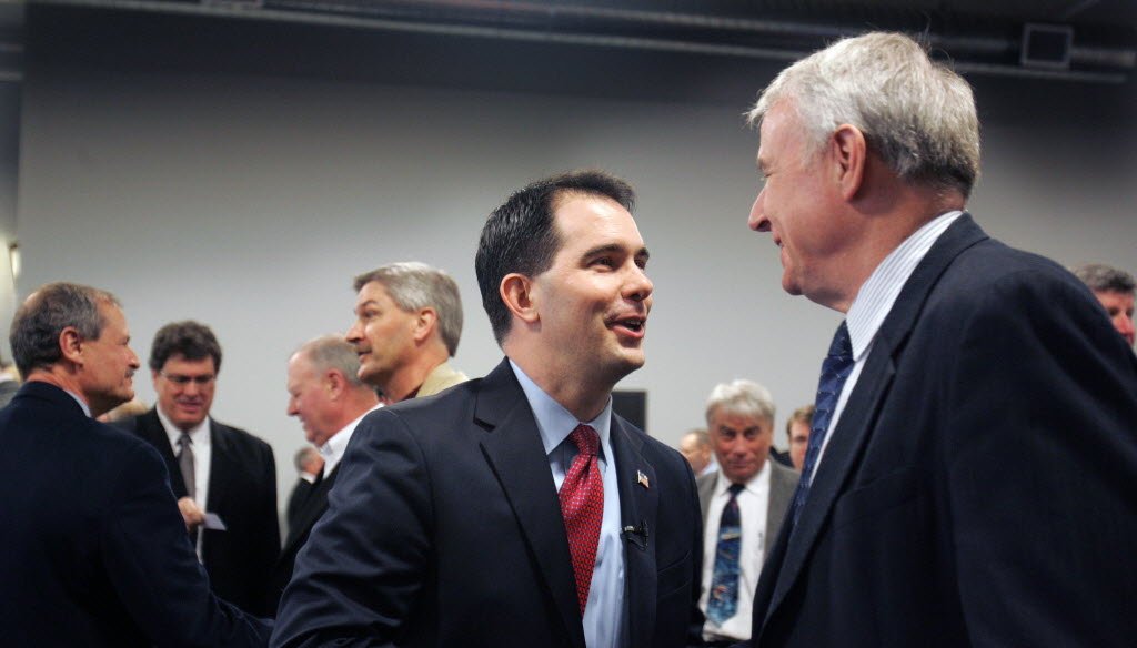 Gov. Scott Walker and recall challenger Tom Barrett have traded accusations about out-of-state money in the race.