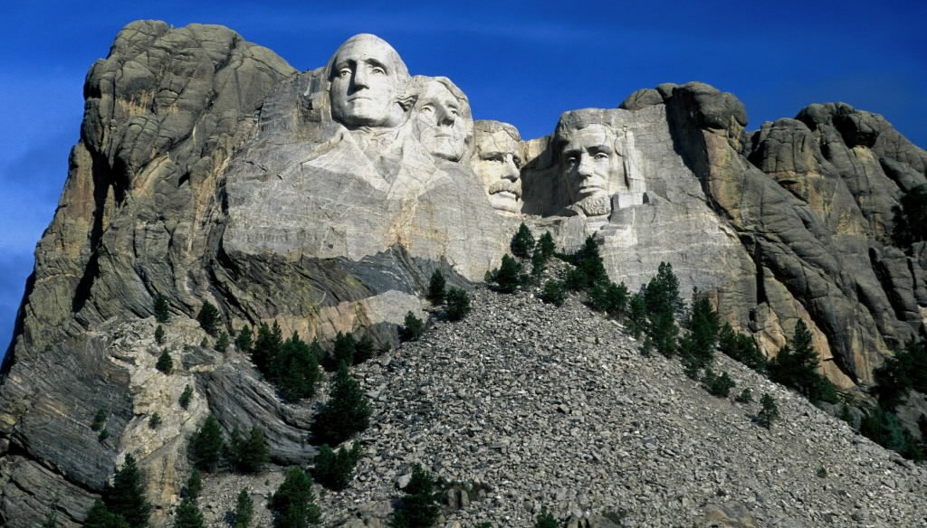 Presidents depicted in stone at Mount Rushmore are, from left, George Washington, Thomas Jefferson, Theodore Roosevelt and Abraham Lincoln.  