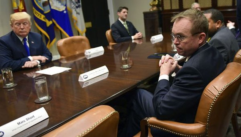 White House budget director Mick Mulvaney, right, attends a meeting with President Donald Trump, left, in the Roosevelt Room of the White House on Nov. 28, 2017. (AP/Susan Walsh)