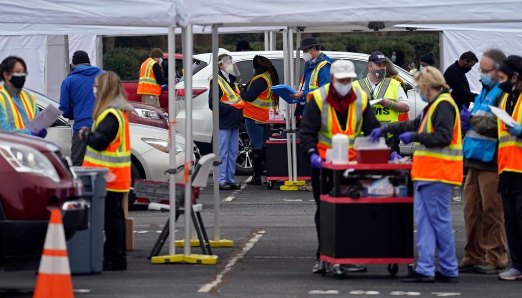 Medical personnel and volunteers operate a drive-thru COVID-19 mass vaccination event at PNC arena in Raleigh, N.C., on Feb. 11, 2021. (AP)