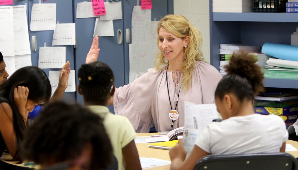 High Point Elementary School 4th-grade teacher Kristin Bierman works with a guided reading group on April 7, 2017, at the school in Clearwater. (DOUGLAS R. CLIFFORD | Times)