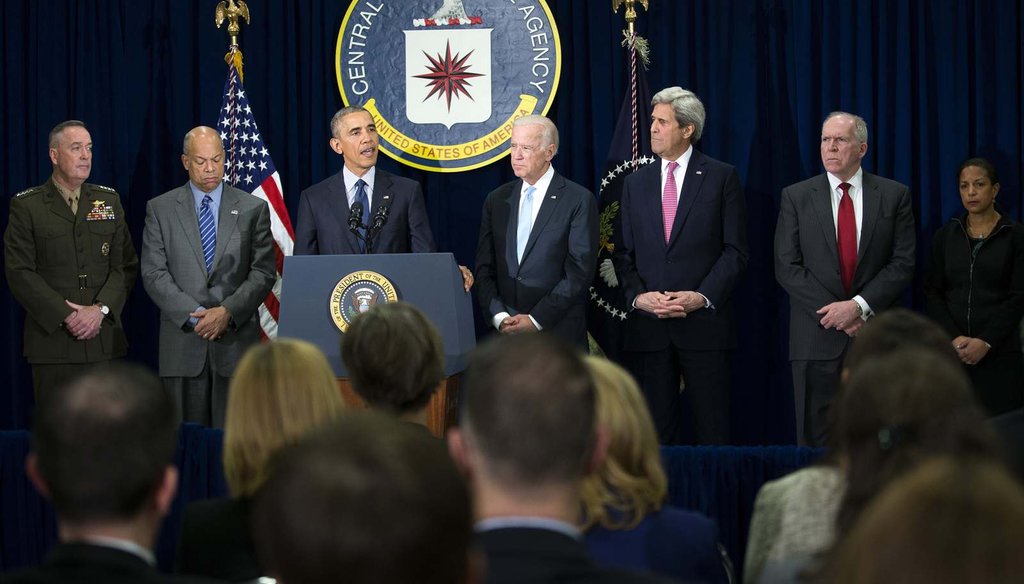President Barack Obama, with a group of national security officials, speaks following a meeting at CIA headquarters in Langley, Va., April 13. (New York Times)