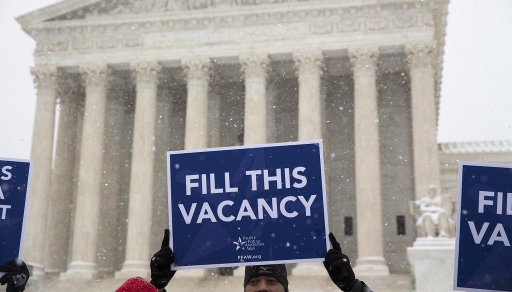 Demonstrators demand a replacement for Justice Antonin Scalia outside of the Supreme Court in Washington, Feb. 15, 2016. (The New York Times)