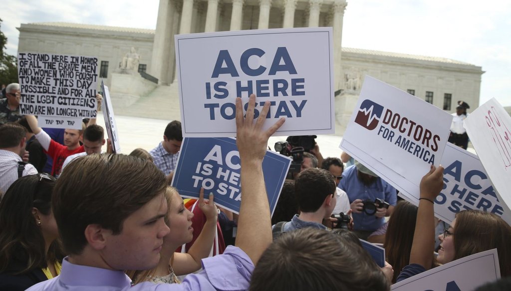 Demonstrators in support of the Affordable Care Act outside the U.S. Supreme Court in Washington, June 25, 2015.