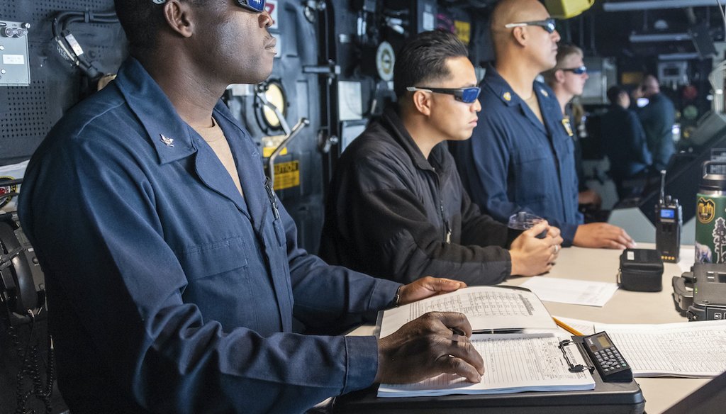 Navy sailors aboard amphibious transport dock ship USS Portland observe a demonstration on Dec. 14, 2021. (AP)