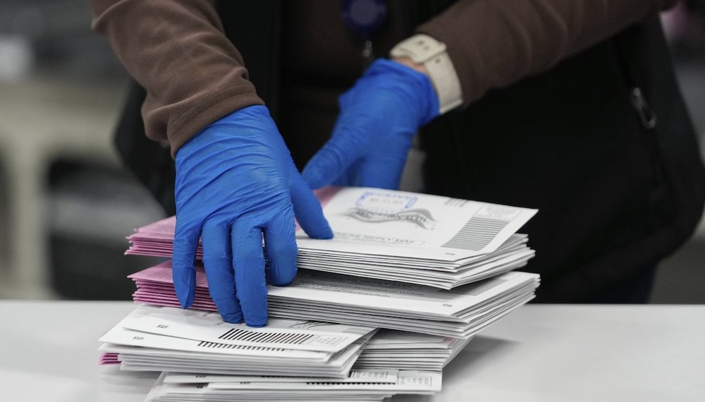 An Election worker sorts mail-in ballots at the Washoe County Registrar of Voters office, Nov. 5, 2024, in Reno, Nev. (AP)