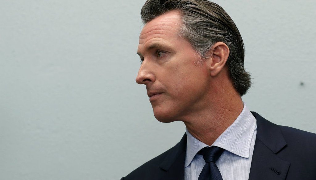 California Governor-elect Gavin Newsom looks on during a news conference near the border Thursday, Nov. 29, 2018, in San Diego. (AP Photo/Gregory Bull)