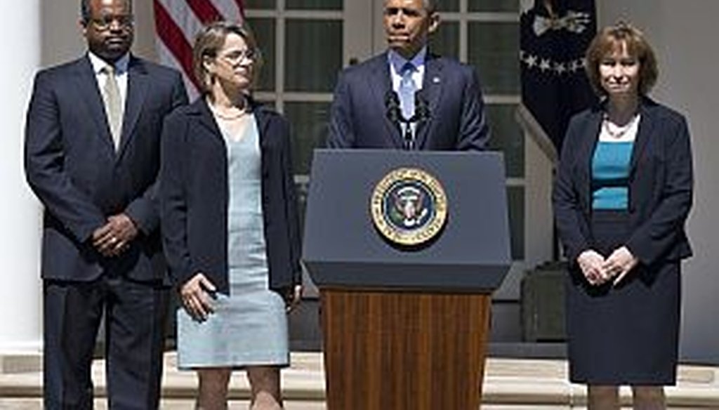 President Barack Obama with Robert Wilkins, Cornelia Pillard and Patricia Ann Millet, his nominees to the D.C. Circuit Court of Appeals.