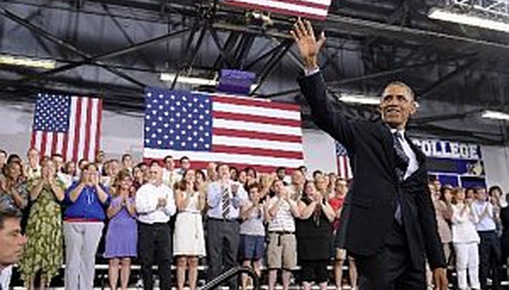 President Barack Obama waves after giving a speech on the economy at Knox College  in Galesburg, Ill. (AP Photo)