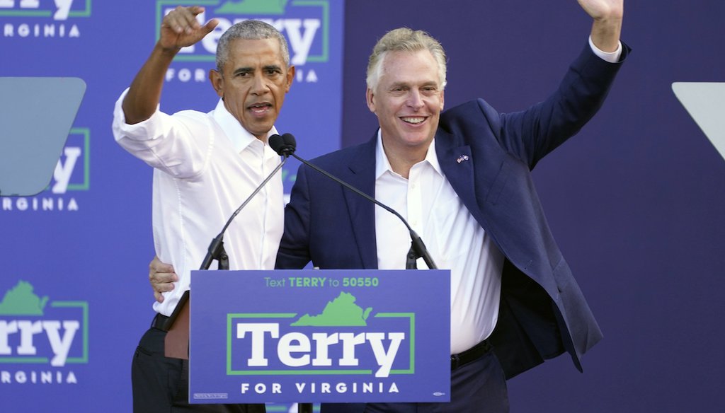 Former President Barack Obama, left, waves to the crowd along with Democratic gubernatorial candidate, former Virginia Gov. Terry McAuliffe during a rally in Richmond, Va., Saturday, Oct. 23, 2021. (AP)
