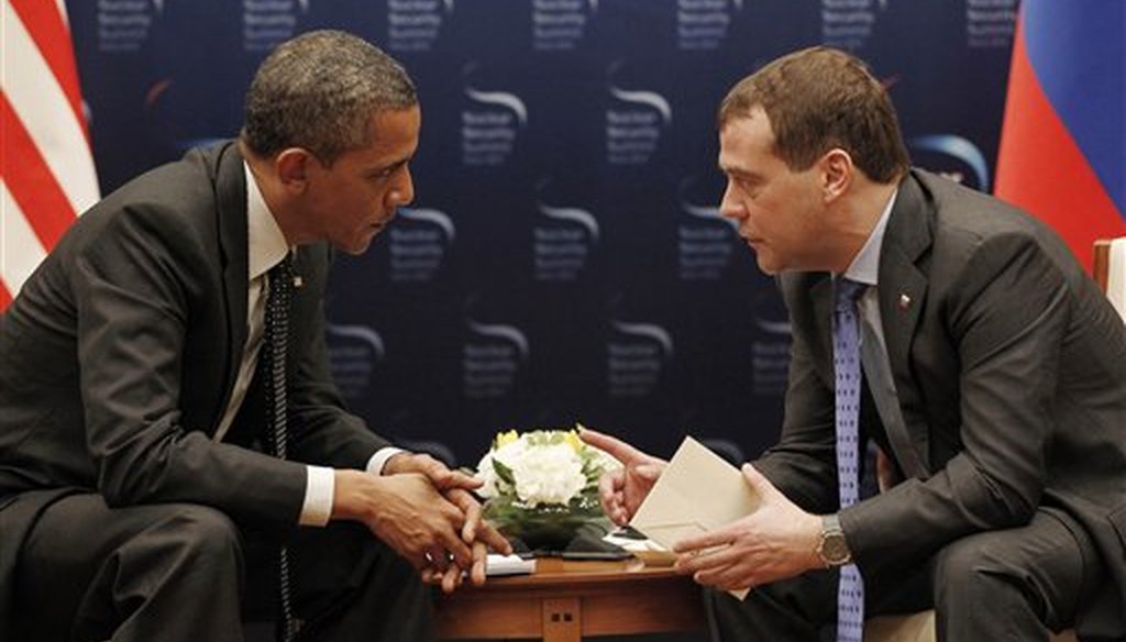 U.S. President Barack Obama, left, and Russian President Dmitry Medvedev chat during a bilateral meeting at the Nuclear Security Summit in Seoul, South Korea, Monday, March, 26, 2012. (AP)