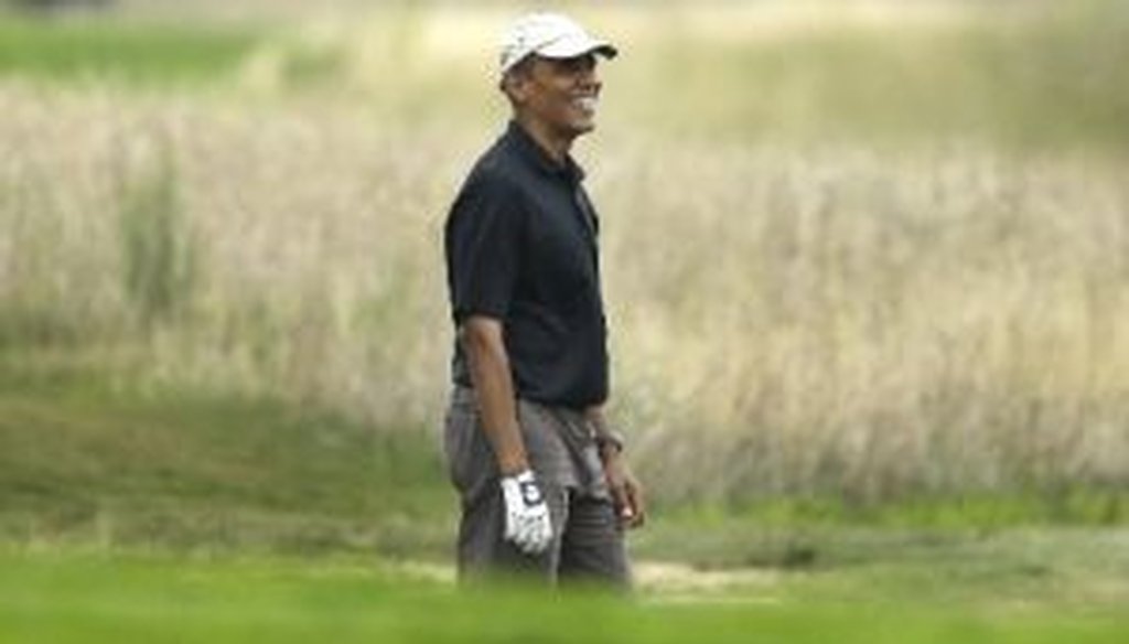 President Barack Obama golfs at the Vineyard Golf Club in Edgartown, Mass., Aug. 12, 2013.