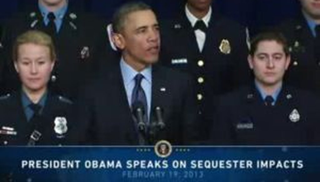 President Barack Obama, surrounded by uniformed law enforcement officers, outlined pitfalls of a budgetary sequester during a speech on Feb. 19, 2013.
