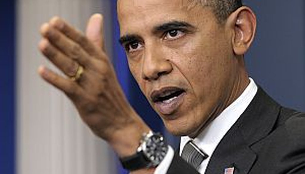 President Obama defends a tax compromise at a press conference on Tuesday.