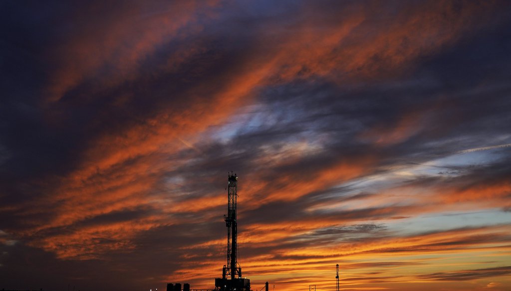Oil drilling rigs are pictured at sunset on March 7, 2022, in El Reno, Oklahoma. (AP)