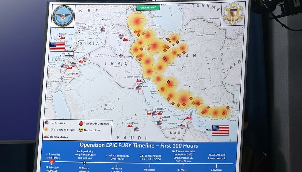 A Dept. of Defense map entitled, Operation EPIC FURY Timeline - First 100 Hours, is displayed during a news conference with Defense Secretary Pete Hegseth and Chairman of the Joint Chiefs of Staff Gen. Dan Caine, at the Pentagon, March 4, 2026, (AP)
