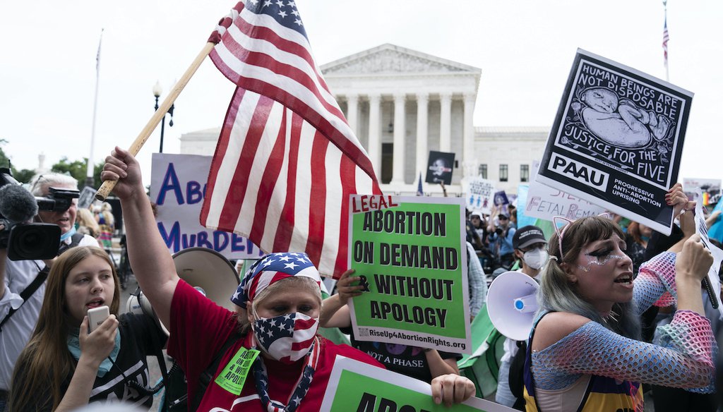 Anti-abortion and abortion-rights protesters gather outside the Supreme Court in Washington, Friday, June 24, 2022. The Supreme Court has ended constitutional protections for abortion that had been in place nearly 50 years. (AP)