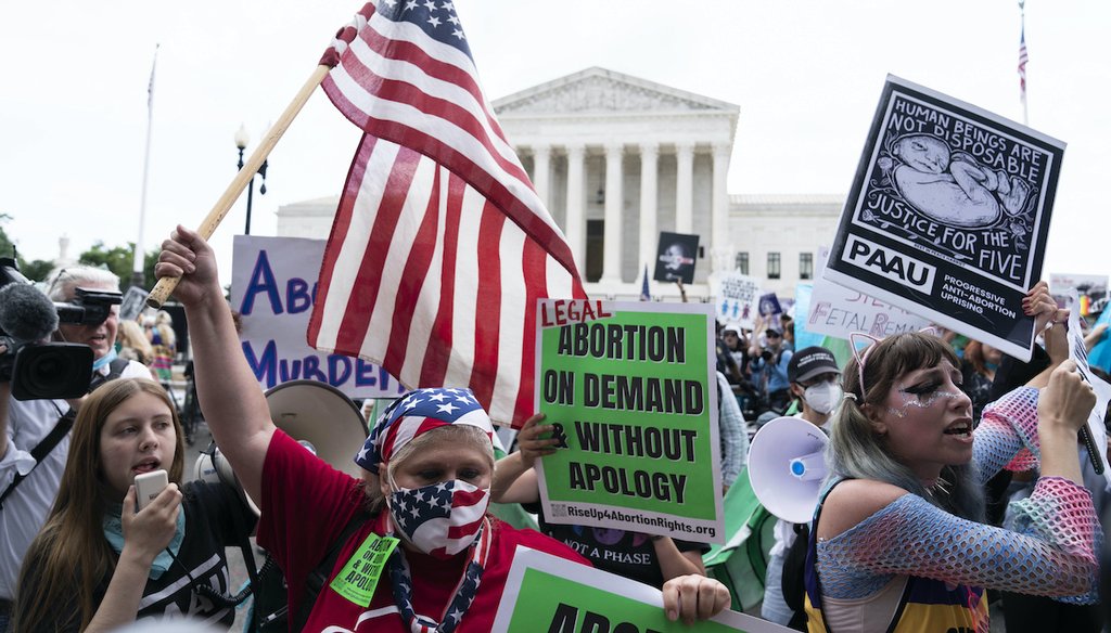 Anti-abortion and abortion-rights protesters gather June 24, 2022, outside the Supreme Court in Washington. (AP)