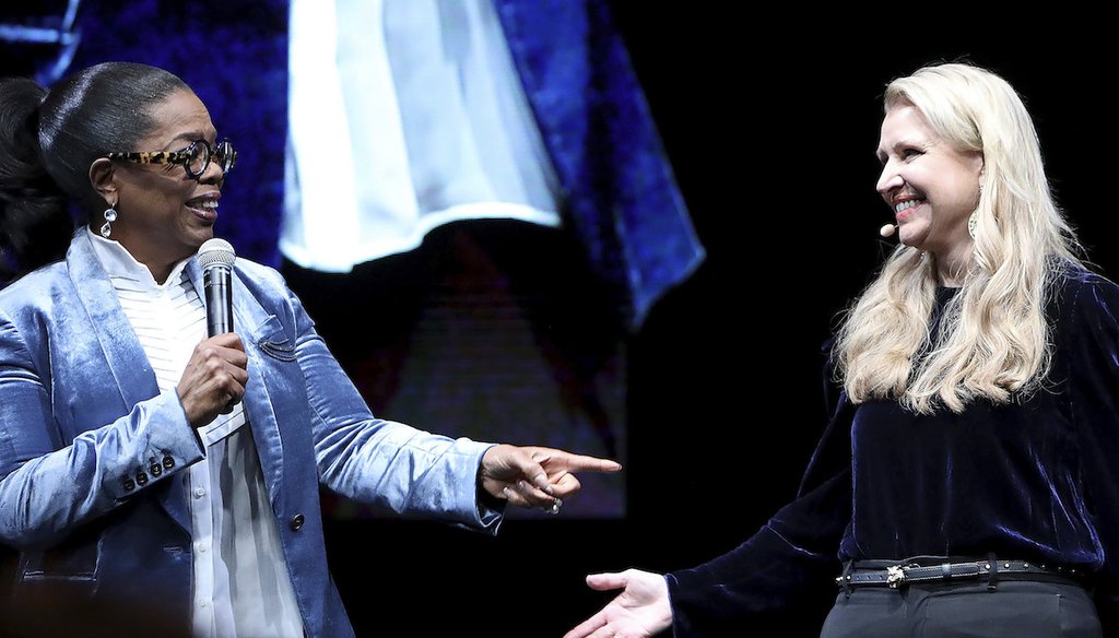 Oprah Winfrey joins WW President and CEO Mindy Grossman onstage at a global WW employee event on Feb. 7, 2018,  in New York. (AP)