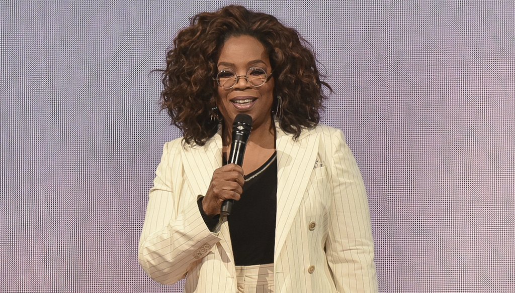 Oprah Winfrey makes opening remarks during "Oprah's 2020 Vision" tour in Inglewood, California, in this file photo from Feb. 29, 2020. (Photo by Richard Shotwell/Invision/AP,)