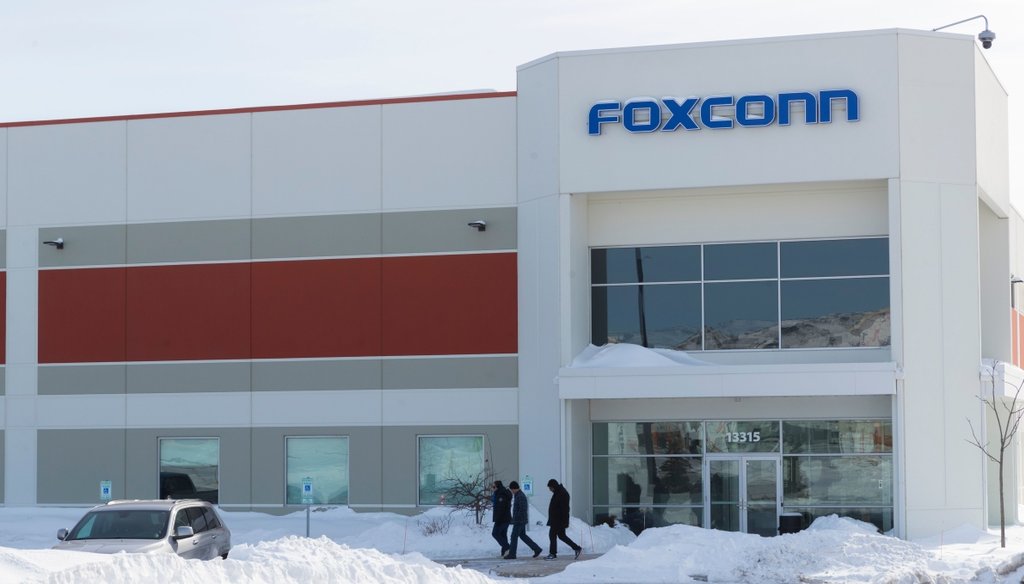 A group exits a Foxconn building on Globe Drive in Mount Pleasant on Feb. 10, 2019. Mark Hoffman/Milwaukee Journal Sentinel