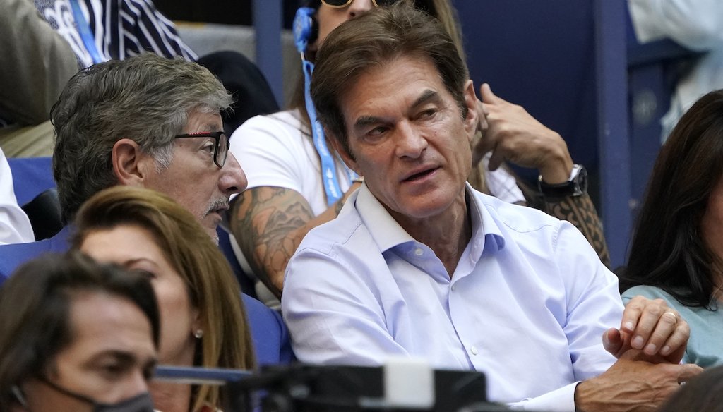 Dr. Mehmet Oz, right, at the 2021 US Open tennis championships. The television personality is running in the Republican primary for the U.S. Senate. (AP)