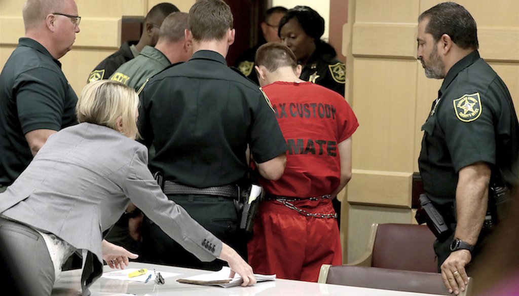 Nikolas Cruz leaves court in Fort Lauderdale, Fla., on Feb. 19, 2018. Cruz is charged with killing 17 people and wounding many others in an attack at Marjory Stoneman Douglas High School in Parkland. (South Florida Sun-Sentinel via AP, pool)