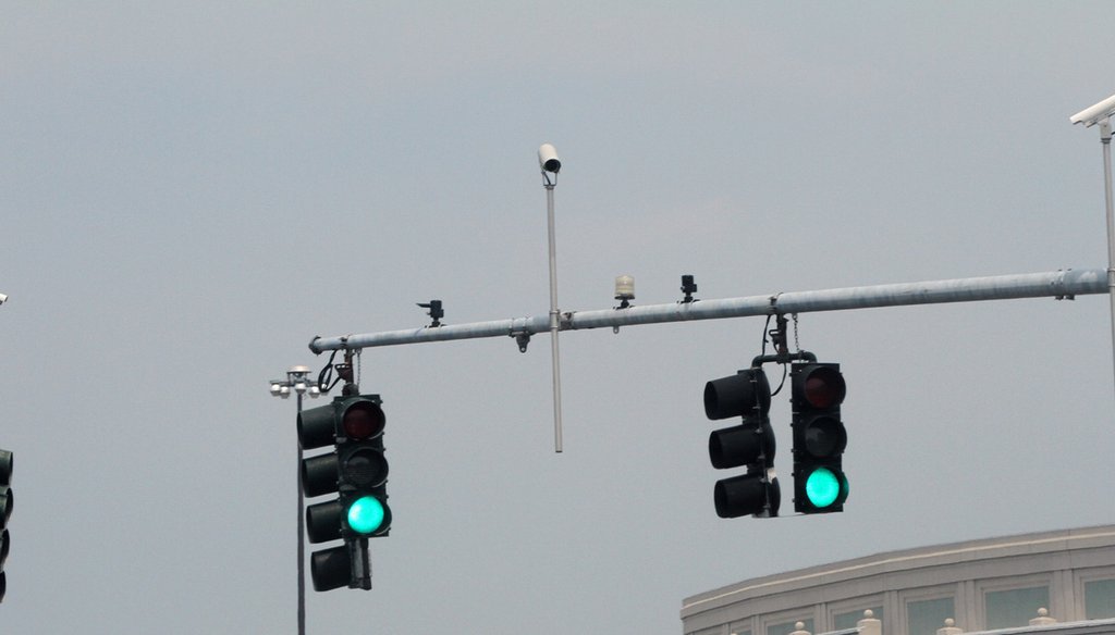 Traffic light cameras monitor the intersection of Service Road 8 and Atwells Avenue in Providence, R.I. (The Providence Journal / Mary Murphy)