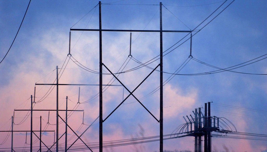 Power lines stretch across the sky. (Providence Journal file photo)