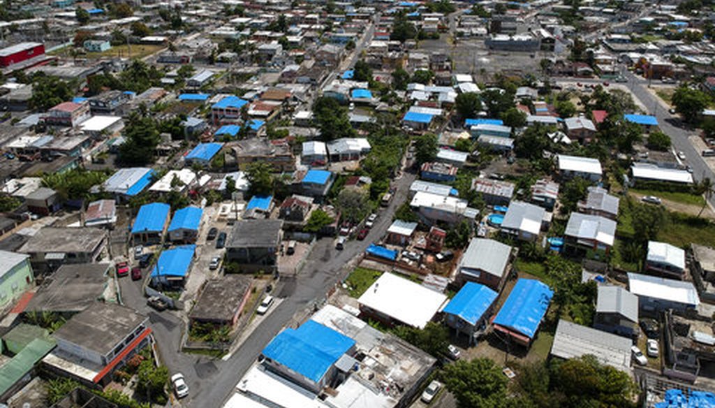 This June 18, 2018 photo shows an aerial view of the Amelia neighborhood in the municipality of Catano following Hurricane Maria in Puerto Rico. (AP)
