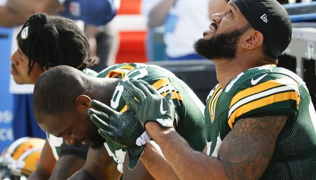 Detroit Lions stand with arms locked for national anthem before NFL  preseason opener against Oakland Raiders