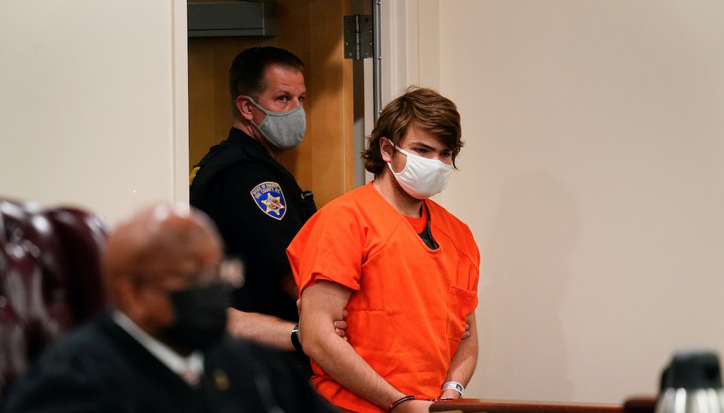Payton Gendron, who cited the racist "great replacement theory" prior to being arrested on charges related to the May 14 fatal shooting at a Buffalo, N.Y., supermarket, is led into the courtroom for a hearing at Erie County Court, May 19, 2022. (AP)