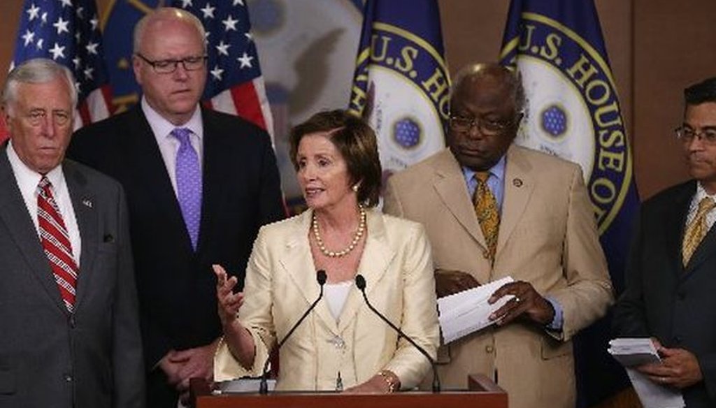House Minority Leader Nancy Pelosi, D-Calif., joins fellow Democratic leaders in condemning a party-line vote by the House to authorize a lawsuit against President Barack Obama on July 30, 2014.