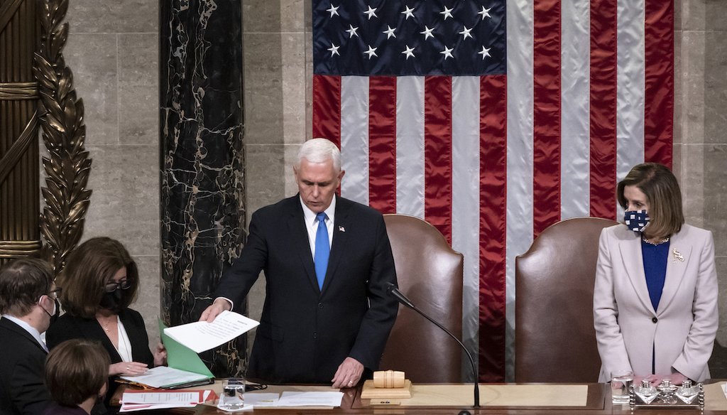 Vice President Mike Pence and Speaker of the House Nancy Pelosi, D-Calif., oversee Electoral College vote certification after a mob loyal to President Donald Trump stormed the Capitol in Washington and disrupted the process, Jan. 7, 2021 (AP)