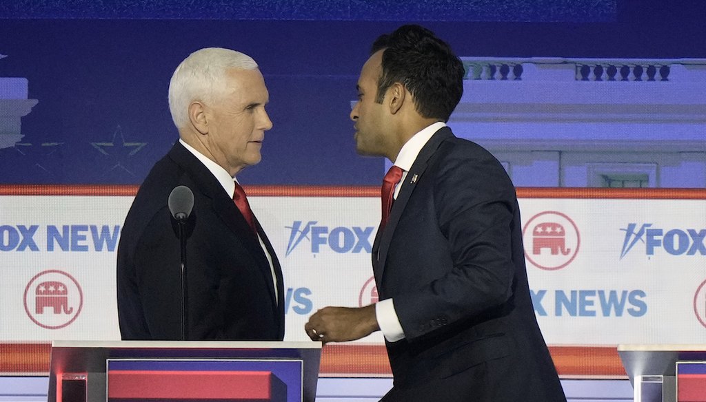 Businessman Vivek Ramaswamy shakes hands with former Vice President Mike Pence on Aug. 23, 2023, after a Republican presidential primary debate at Fiserv Forum in Milwaukee. (AP)
