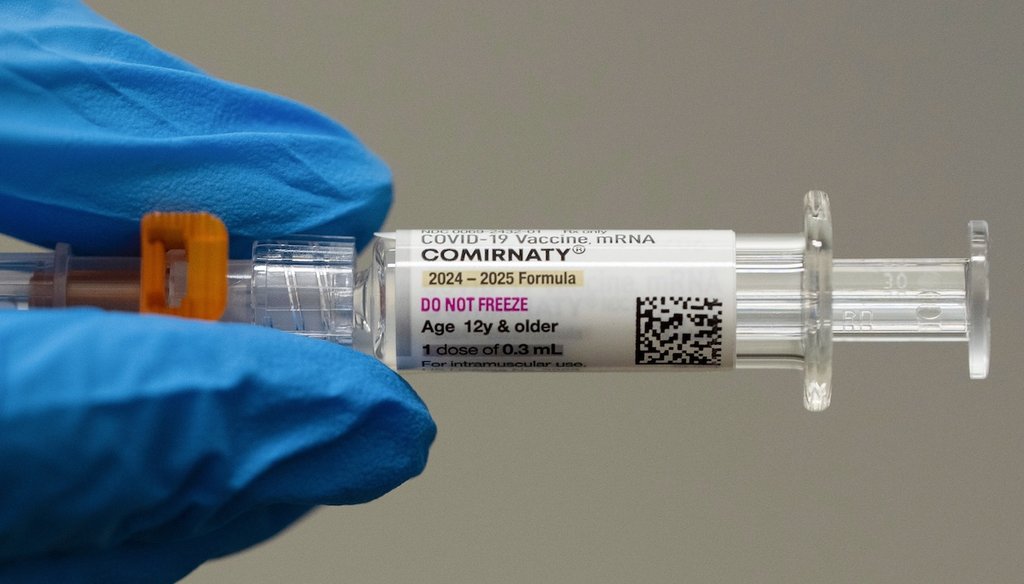 A pharmacist holds a Pfizer and BioNTech COVID-19 vaccine shot on April 24, 2025, in Portland, Ore. (AP)