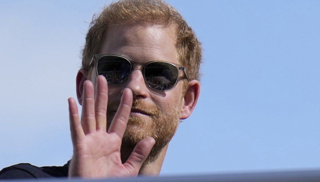 Britain's Prince Harry, the Duke of Sussex, waves during the Formula One U.S. Grand Prix auto race at Circuit of the Americas, on Oct. 22, 2023, in Austin, Texas. (AP)