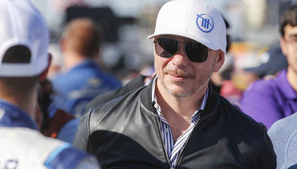 American rapper Pitbull walks through pit road before a NASCAR Cup Series auto race at Charlotte Motor Speedway in Concord, North Carolina, May 30, 2021. (AP)