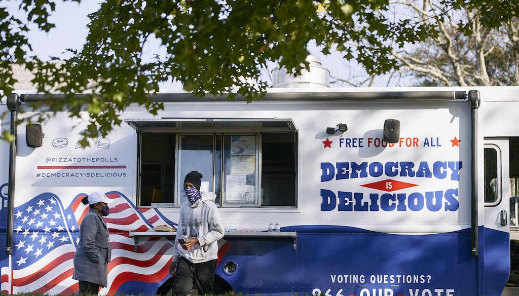 Food trucks wait on site at local polling locations as long lines form on Election Day, Tuesday, Nov. 3, 2020, in Atlanta. (AP)