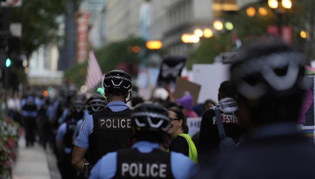 Police walk along as people march during Illinois Coalition for Immigrant & Refugee Rights' "Chicago Says No Trump No Troops" protest Sept. 6, 2025, in Chicago. (AP)