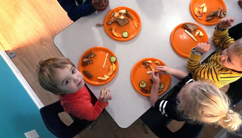 Preschool children eat lunch at a day care facility, Monday, Oct. 25, 2021, in Mountlake Terrace, Wash. (AP)