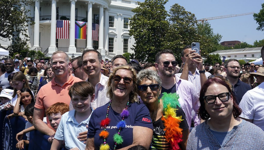 People listen as President Joe Biden speaks at a Pride Month celebration on the South Lawn of the White House, June 10, 2023, in Washington. (AP)