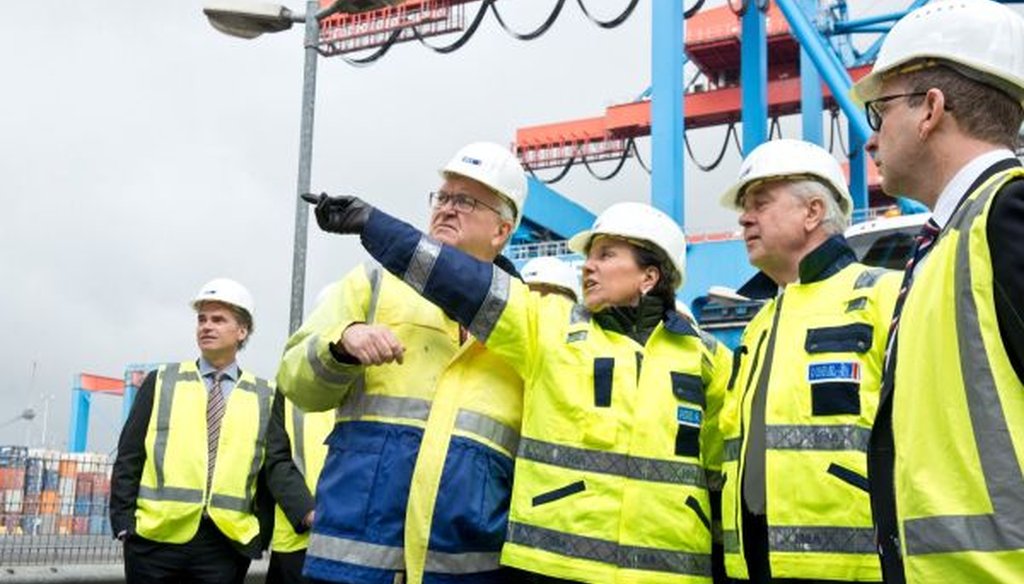 U.S. Commerce Secretary Penny Pritzker (pointing) tours the Port of Hamburg in Germany.