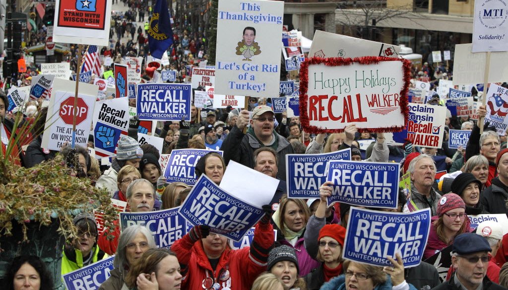 Demonstrators protesting what would become Act 10, Gov. Scott Walker's collective bargaining reform law, gathered in Madison on Nov. 19, 2011. Police estimated the crowd at 68,000 people. (Rick Wood photo)