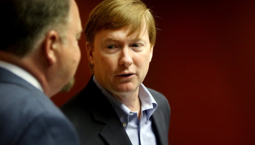 Adam Putnam, Commissioner of the Florida Department of Agriculture and Consumer Services, center, visits with Charles W. Thomas, Pinellas County Tax Collector, at the Pinellas County Courthouse on June 29, 2017. (DOUGLAS R. CLIFFORD | Times)