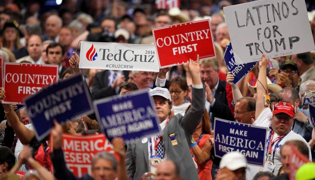 A Ted Cruz supporter holds a sign during his speech on the third day of the Republican National Convention in Cleveland, Wednesday, July 20, 2016. (AP Photo/Mark J. Terrill)