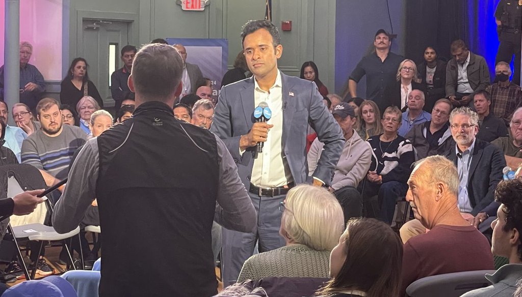 Republican presidential candidate Vivek Ramaswamy listens to a questioner at a town hall in Exeter, N.H., on Oct. 14, 2023. (Louis Jacobson/PolitiFact)