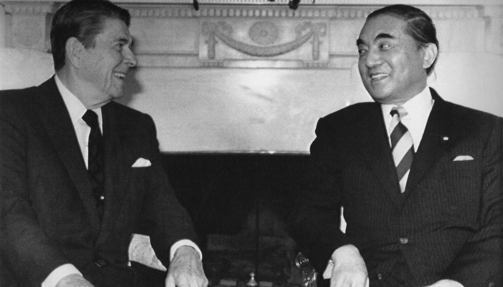 President Ronald Reagan, left, and Japanese Prime Minister Yasuhiro Nakasone begin two days of meetings in the White House Oval Office, on April 30, 1987 to discuss trade. (AP)